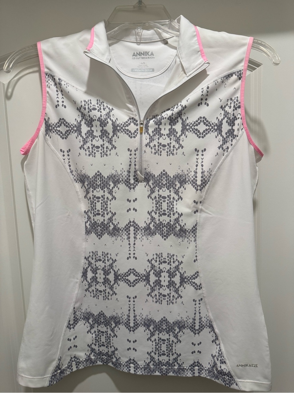 Annika White Sleeveless Athletic Polo with Pink Trim